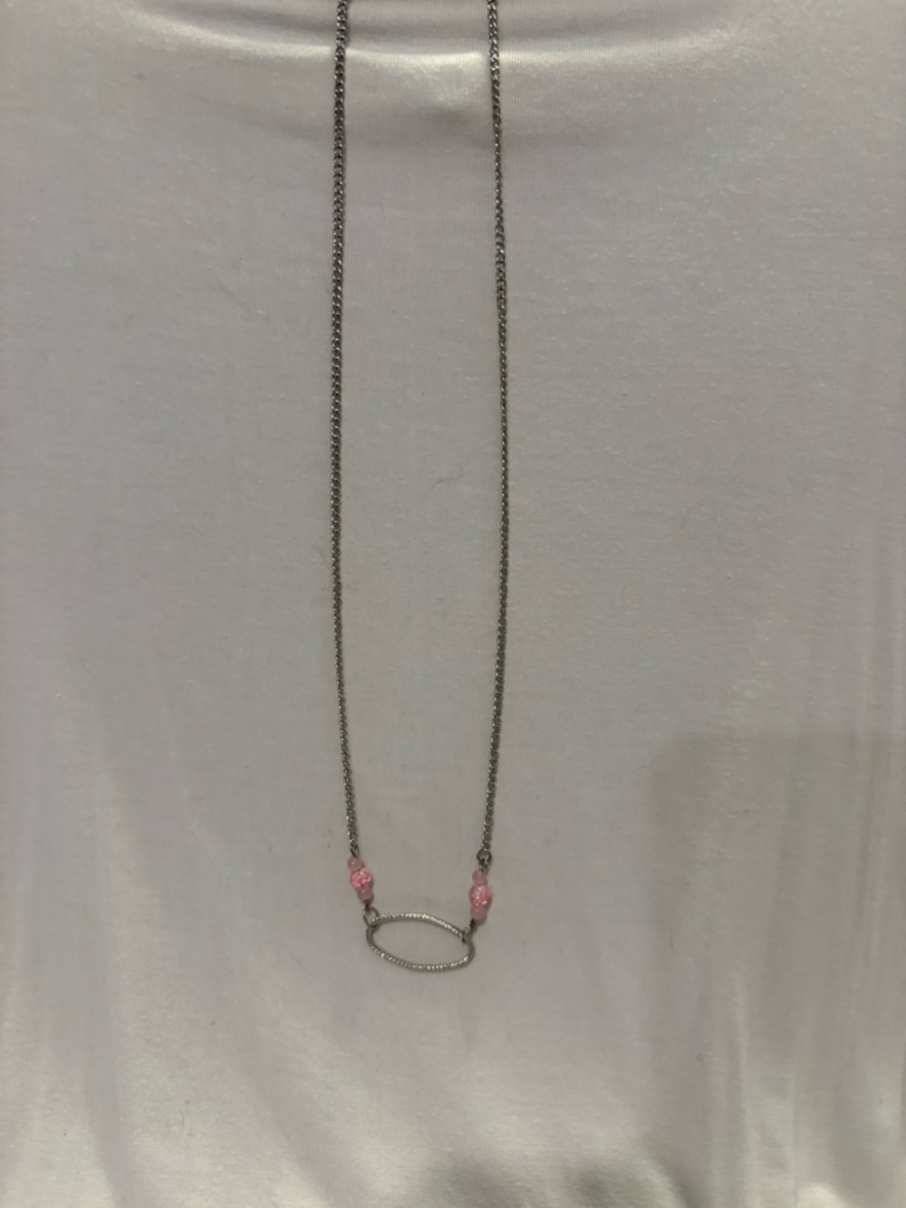 Silver Oval Pendant Necklace with Pink Accents